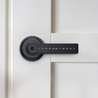 Gainsborough Mode Smart Lever Lock in matte black zinc alloy, featuring an integrated lever handle, backlit PIN keypad, and fingerprint sensor, designed for stylish keyless entry on interior doors including home offices and personal rooms.